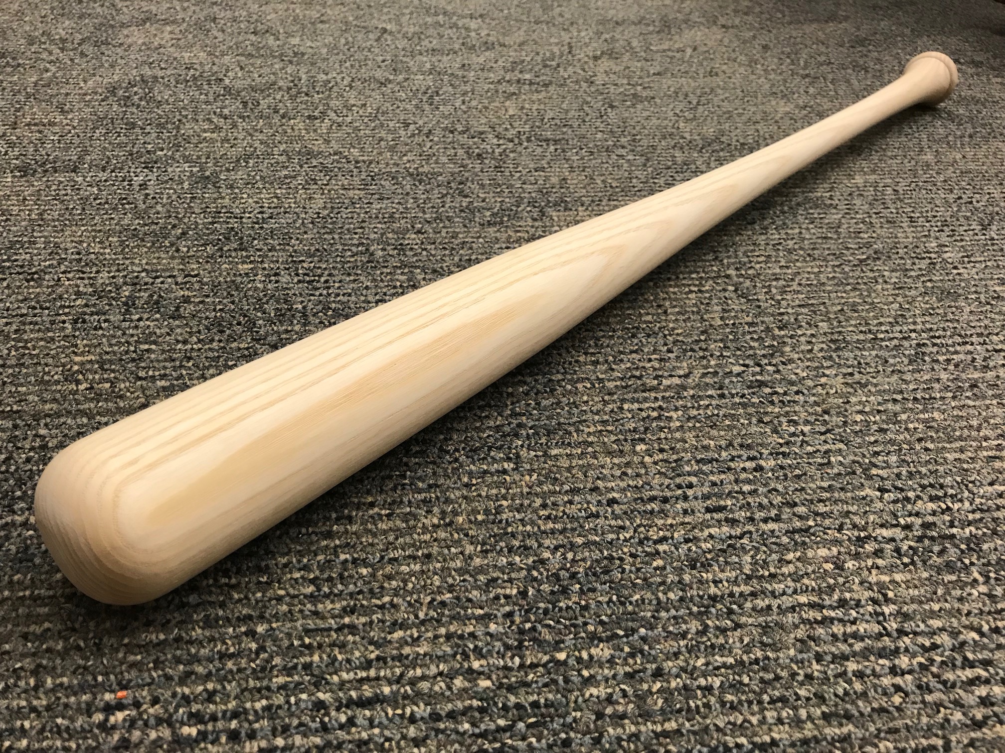 White ash baseball bat, image by Rado Gazo